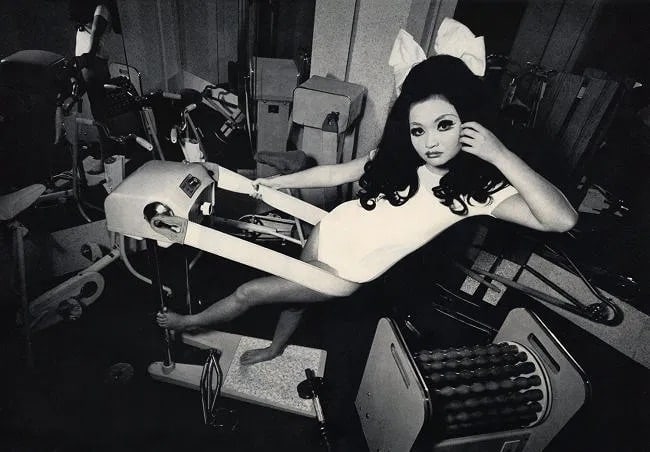 Kishin Shinoyama (Japanese, 1940-2024) Print: Kishin Shinoyama (Japanese, 1940-2024) Print. "Workout". Printed in 1968. 8.00 x 14.00 inches. Not hand-signed unless otherwise stated. Photomechanical Print. Lots that contain nudity have been