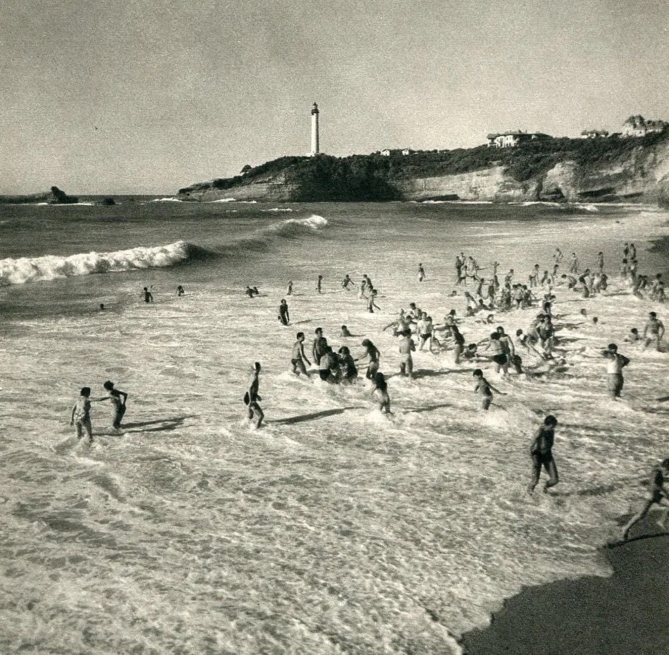 Roger Schall (French, 1904-1995) Print: Roger Schall (French, 1904-1995) Print. Biarritz Beach. Printed in 1950. 6.50 x 6.50 inches. Not hand-signed unless otherwise stated. Photomechanical Print. Lots that contain nudity have been partiall