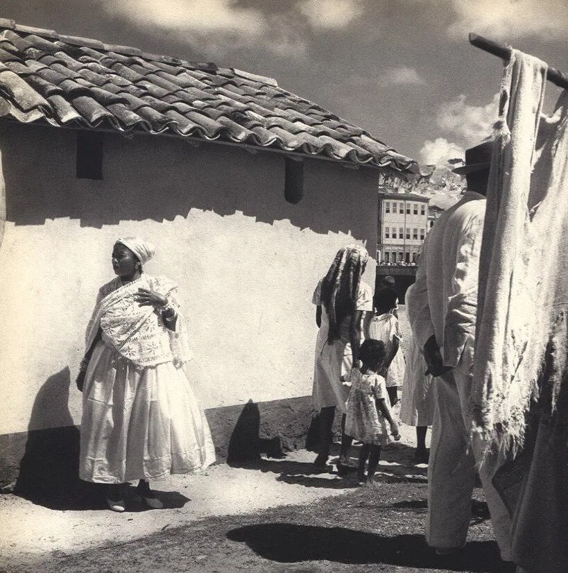 Pierre Verger (French, 1902-1996) Print: Pierre Verger (French, 1902-1996) Print. Women in traditional dress. Printed in 1955. 8.00 x 8.25 inches. Not hand-signed unless otherwise stated. Photomechanical Print. Lots that contain nudity have 