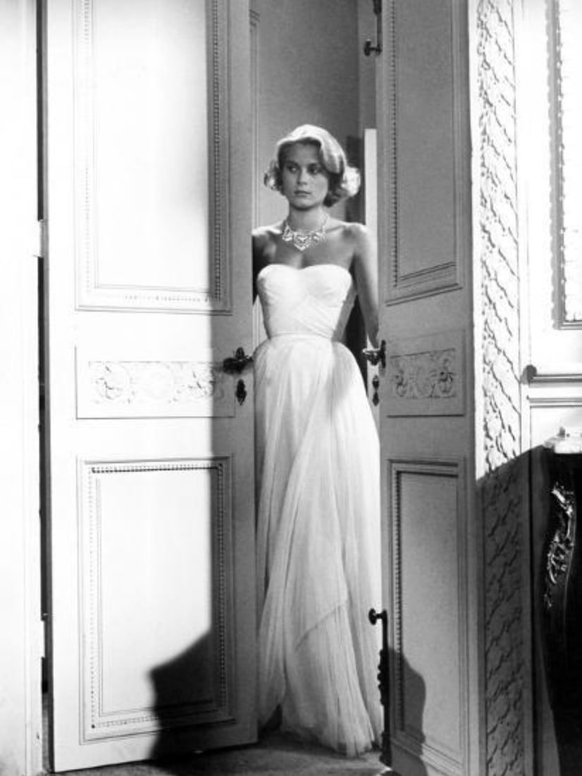 Grace Kelly (American, 1929-1982) Print: Grace Kelly (American, 1929-1982) Print. To Catch a Thief, "1955". 22.00 x 30.00 inches. Not hand-signed unless otherwise stated. Photomechanical Print. Lots that contain nudity have been partially