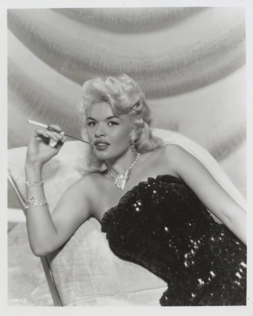 Jayne Mansfield (American, 1933-1967) Silver Gelatin: Jayne Mansfield (American, 1933-1967) Silver Gelatin. 8.00 x 10.00 inches. Printed after the 1950's. Not hand-signed unless otherwise stated. Photomechanical Print. Lots that contain nudity have been