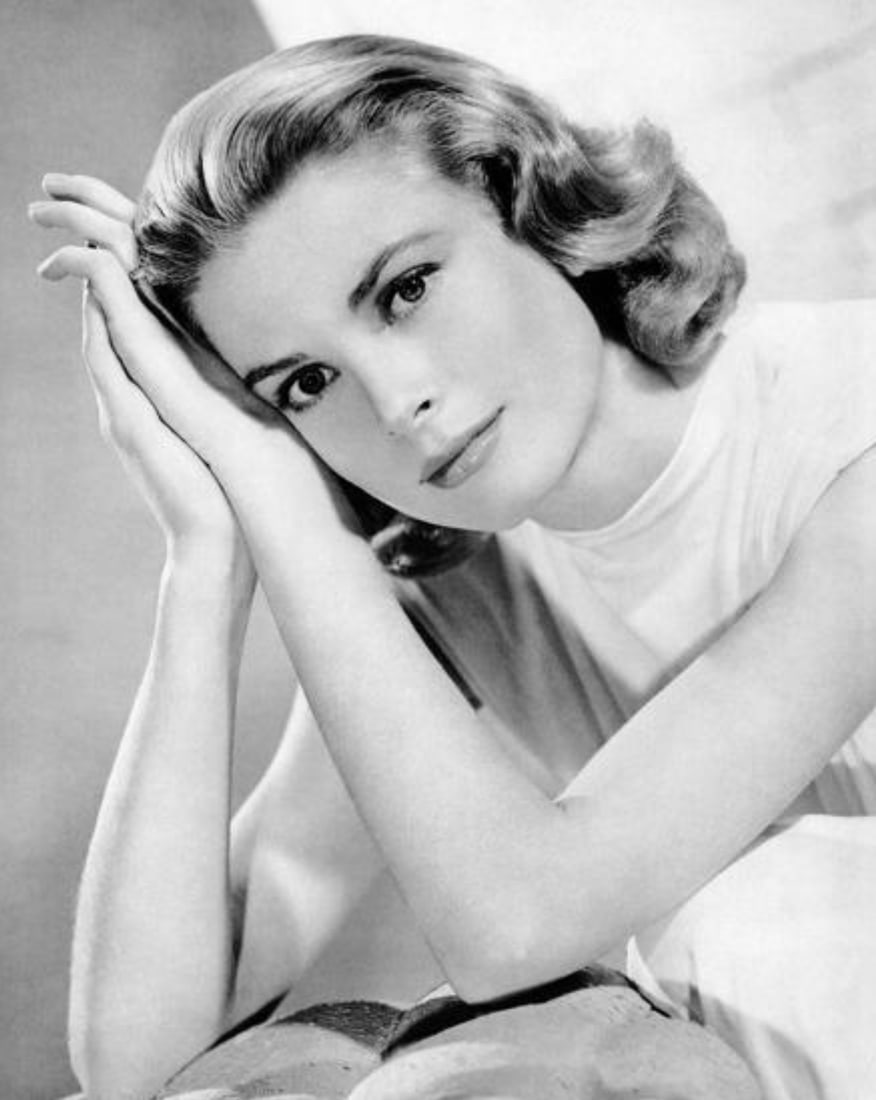 Grace Kelly (American, 1929-1982) Print: Grace Kelly (American, 1929-1982) Print. 23.50 x 28.50 inches. Not hand-signed unless otherwise stated. Photomechanical Print. Lots that contain nudity have been partially obscured in the listing;