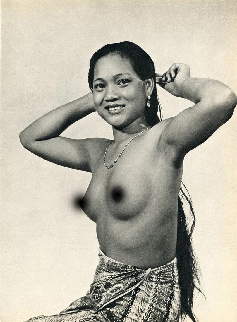 K. F. Wong Print: K. F. Wong Print. Iban Beauty. Printed in 1960, United Kingdom. 8.00 x 11.00 inches. Not hand-signed unless otherwise stated. Photomechanical Print. Lots that contain nudity have been partially obscur