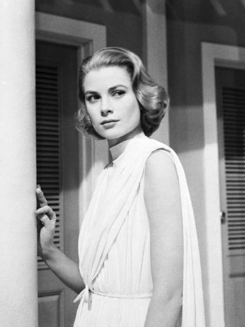 Grace Kelly (American, 1929-1982) Print: Grace Kelly (American, 1929-1982) Print. High Society, "1956". 29.50 x 38.50 inches. Not hand-signed unless otherwise stated. Photomechanical Print. Lots that contain nudity have been partially obscur