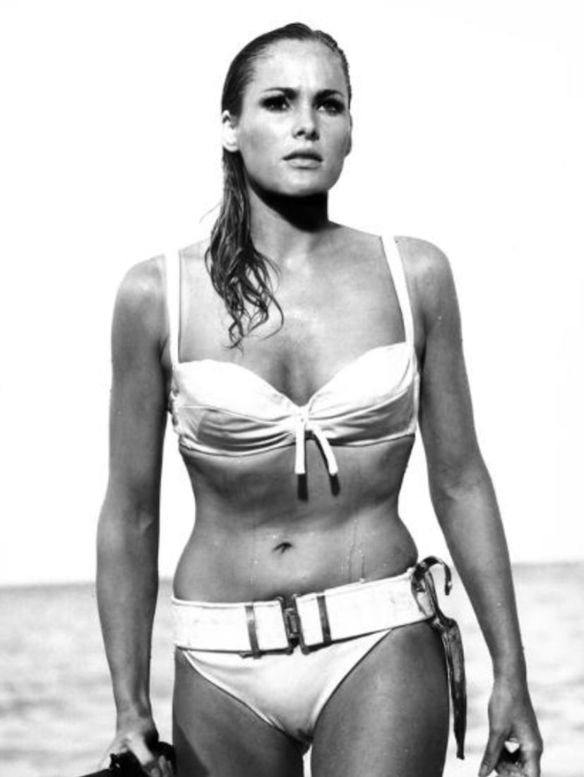 Ursula Andress (Swiss, b. 1936) Print: Ursula Andress (Swiss, b. 1936) Print. James Bond, Dr. No, "1962". 17.00 x 22.50 inches. Not hand-signed unless otherwise stated. Photomechanical Print. Lots that contain nudity have been partially