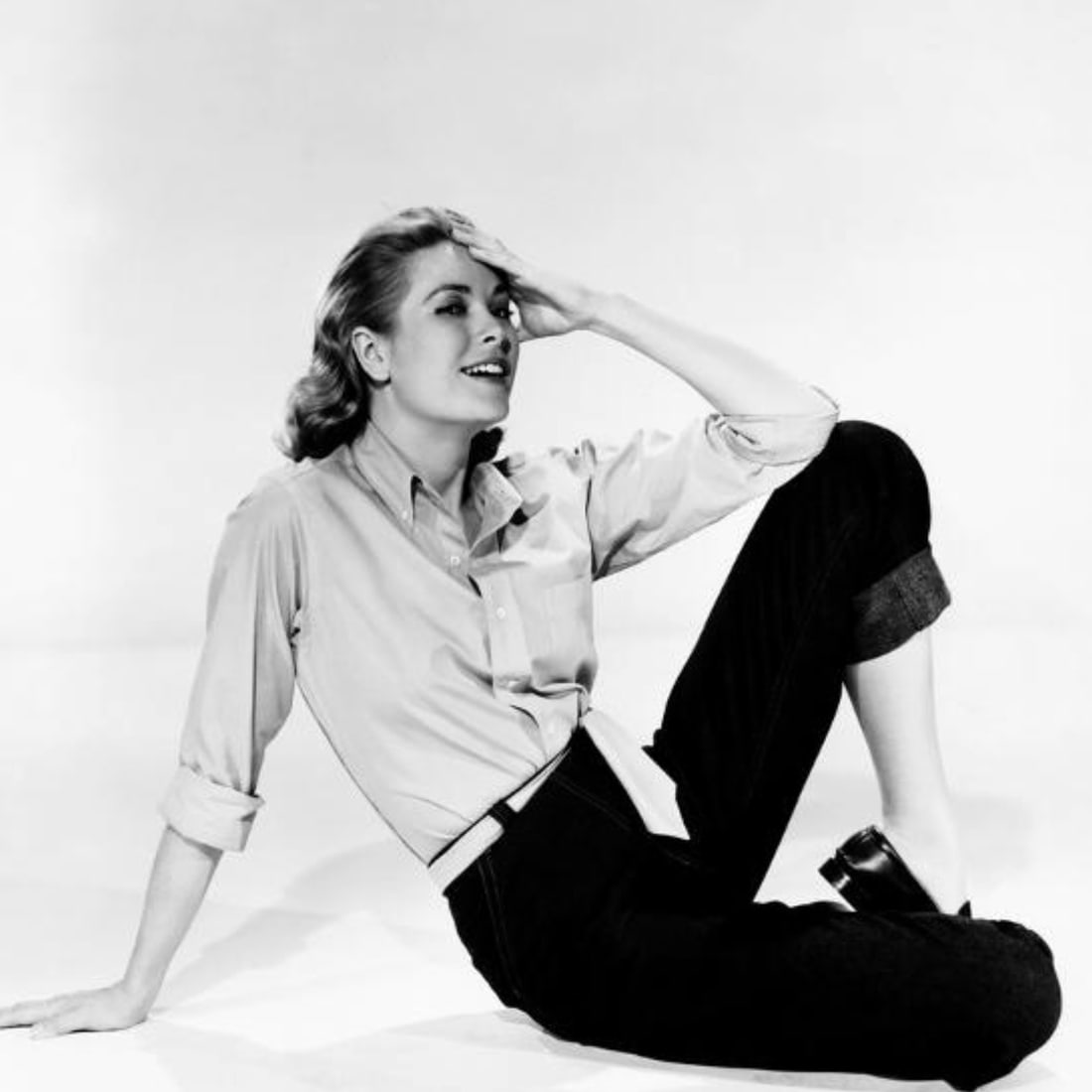 Grace Kelly (American, 1929-1982) Print: Grace Kelly (American, 1929-1982) Print. 23.50 x 23.00 inches. Not hand-signed unless otherwise stated. Photomechanical Print. Lots that contain nudity have been partially obscured in the listing;