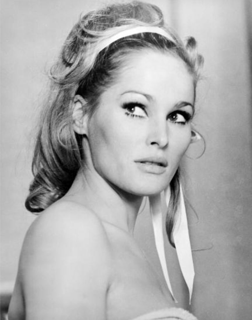 Ursula Andress (Swiss, b. 1936) Print: Ursula Andress (Swiss, b. 1936) Print. James Bond, Casino Royale. 10.00 x 13.00 inches. Not hand-signed unless otherwise stated. Photomechanical Print. Lots that contain nudity have been partially obs