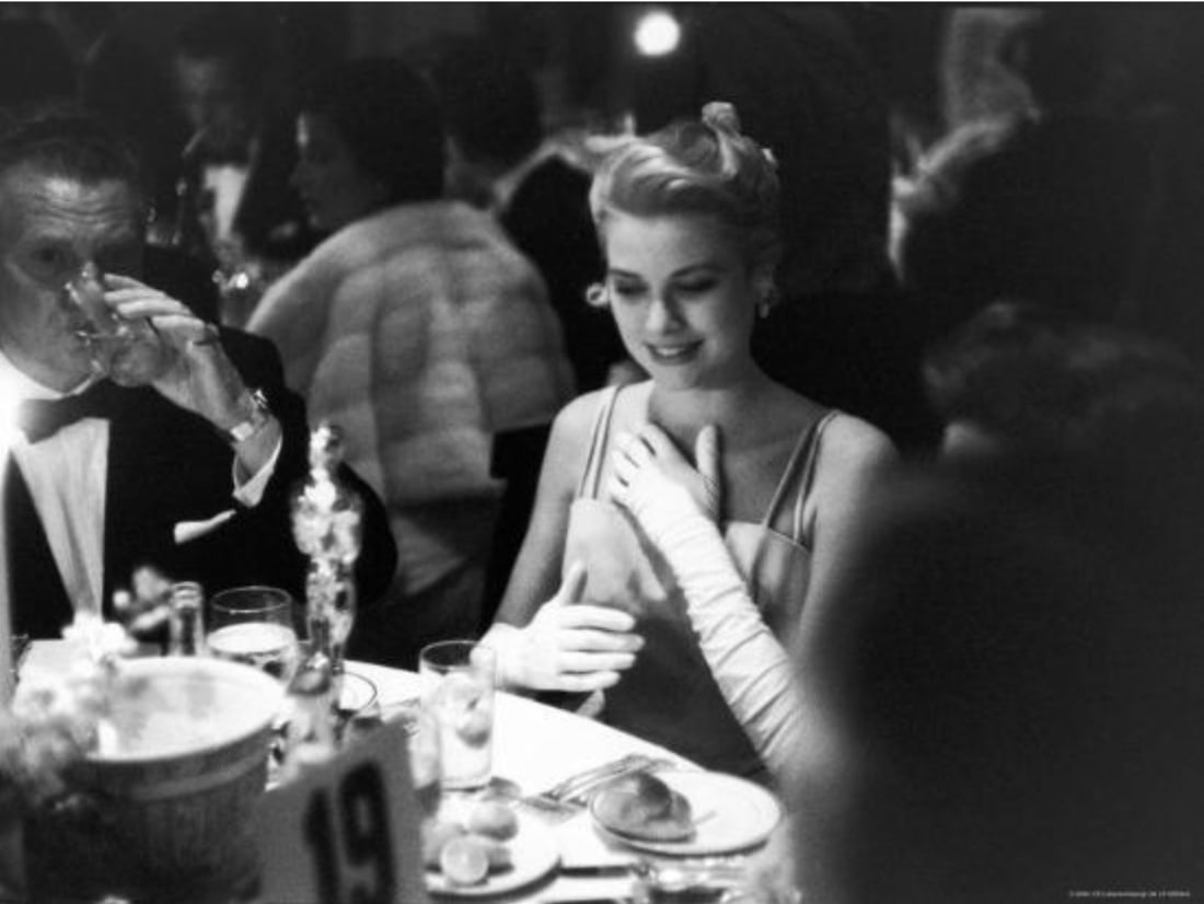 Grace Kelly (American, 1929-1982) Print: Grace Kelly (American, 1929-1982) Print. 31.00 x 22.85 inches. Not hand-signed unless otherwise stated. Photomechanical Print. Lots that contain nudity have been partially obscured in the listing;