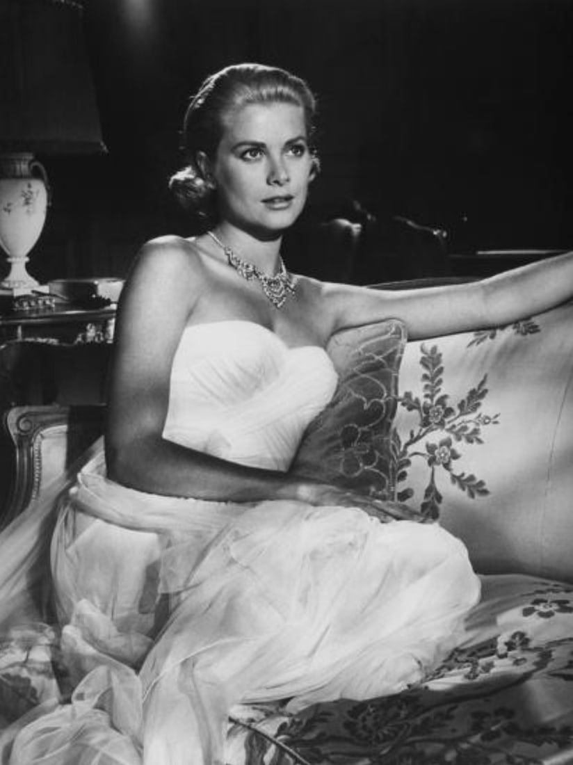 Grace Kelly (American, 1929-1982) Print: Grace Kelly (American, 1929-1982) Print. To Catch a Thief, "1955". 40.00 x 54.00 inches. Not hand-signed unless otherwise stated. Photomechanical Print. Lots that contain nudity have been partially ob