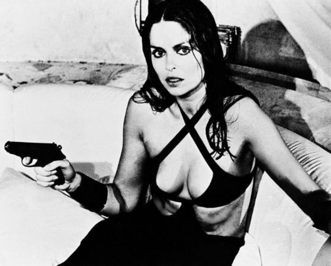 Barbara Bach (American, b. 1947) Print: Barbara Bach (American, b. 1947) Print. James Bond, The Spy Who Loved Me, "1977". 28.50 x 22.00 inches. Not hand-signed unless otherwise stated. Photomechanical Print. Lots that contain nudity have be