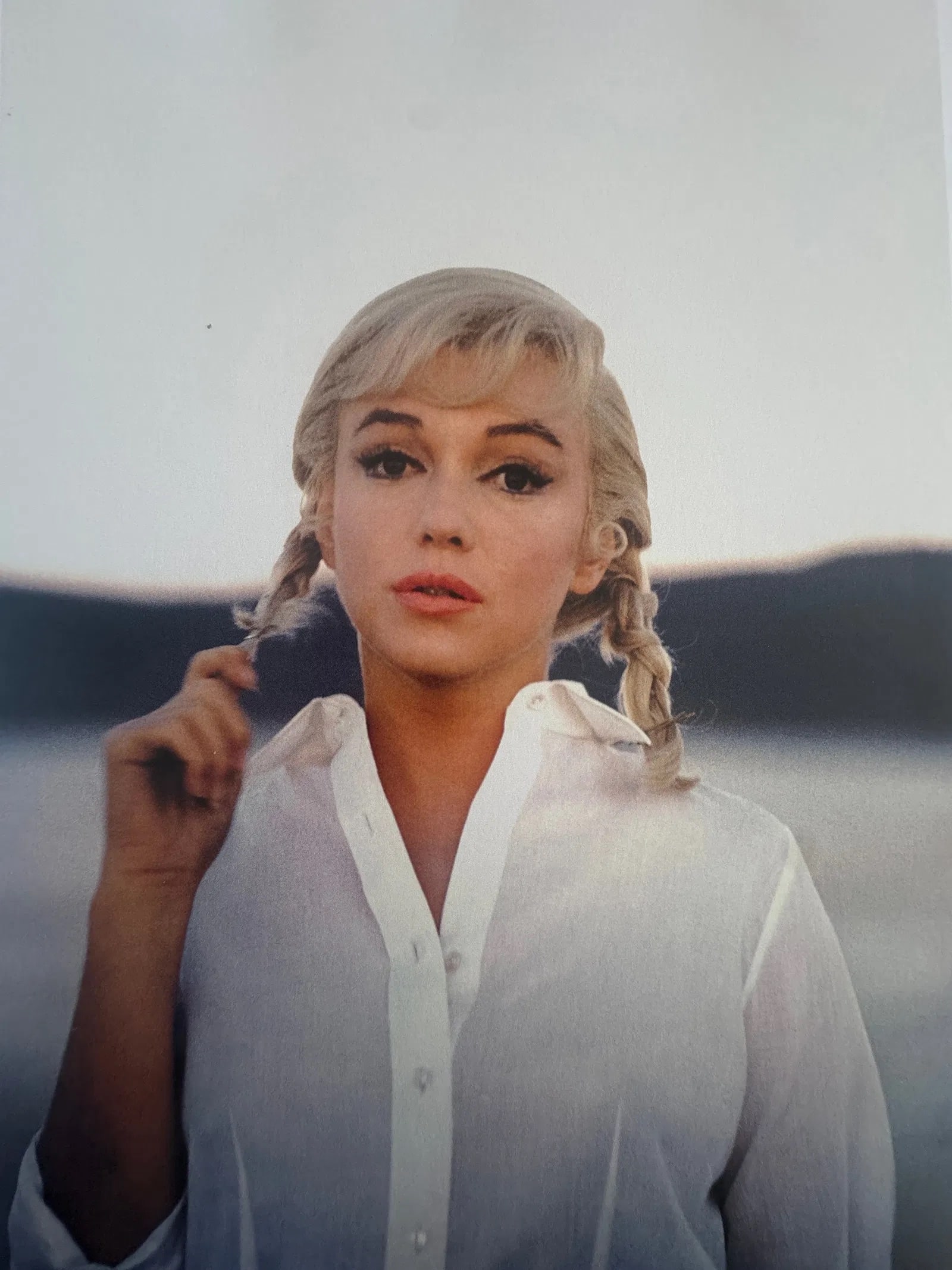 Eve Arnold (American, 1912-2012) Marilyn Monroe Print: Eve Arnold (American, 1912-2012) Marilyn Monroe Print. Printed in Belgium. Marilyn Monroe on set of The Misfits, Nevada, "1960". 9.60 x 6.75 inches. Not hand-signed unless otherwise stated.
