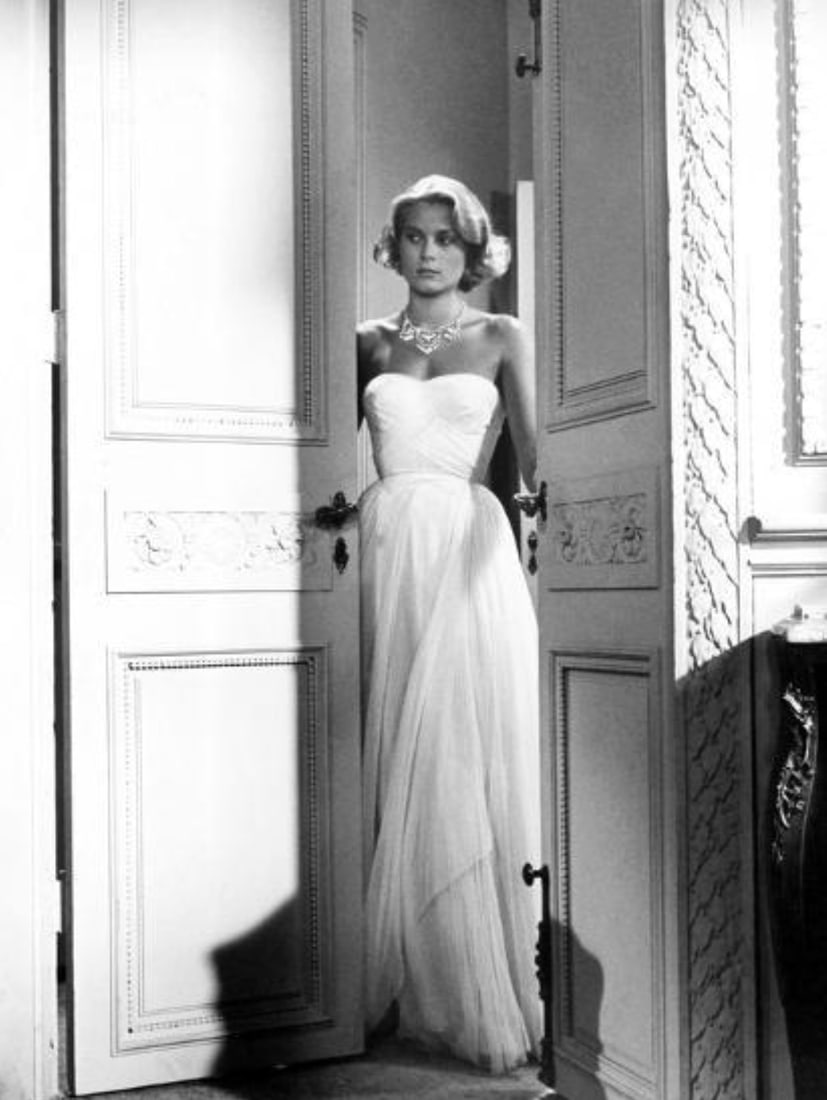 Grace Kelly (American, 1929-1982) Print: Grace Kelly (American, 1929-1982) Print. Rear Window, "1954". 22.00 x 31.00 inches. Not hand-signed unless otherwise stated. Photomechanical Print. Lots that contain nudity have been partially