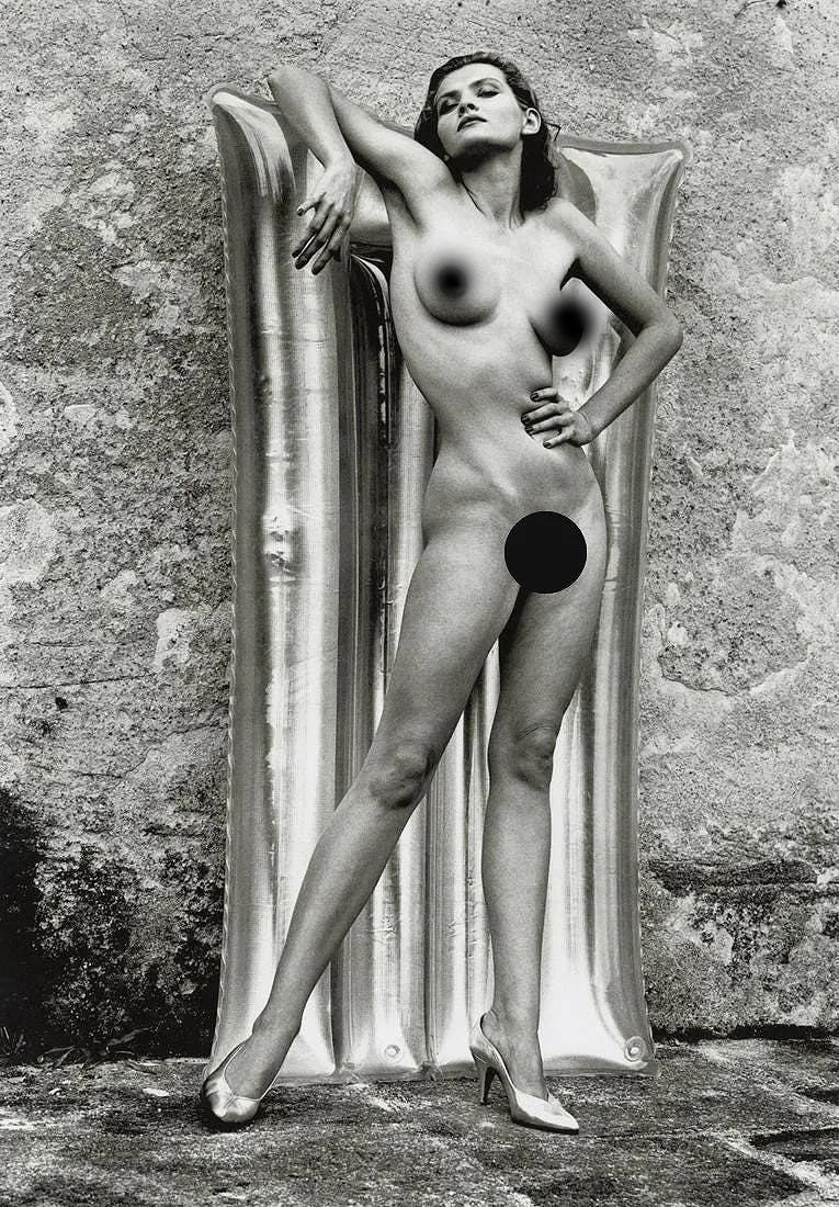 Helmut Newton (German-Australian, 1920-2004) Print: Helmut Newton (German-Australian, 1920-2004) Print. Sylvia, Ramatuelle, France, "1981". Printed in 2009, Italy. 9.60 x 13.75 inches. Not hand-signed unless otherwise stated. Photomechanical Print. Lot