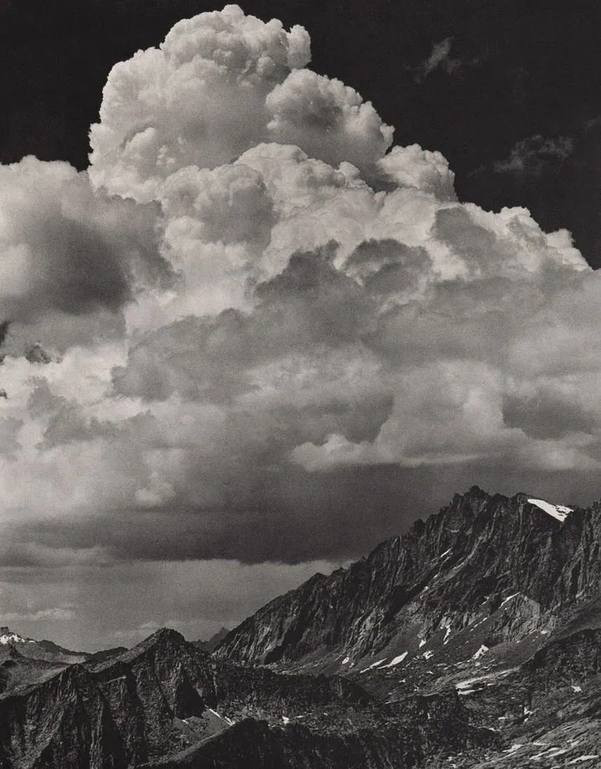 Ansel Adams (American, 1902-1984) Print: Ansel Adams (American, 1902-1984) Print. Thundercloud, Kings Canyon. 9.00 x 7.25 inches. Printed in 1960s. Not hand-signed unless otherwise stated. Photomechanical Print. Lots that contain nudity have