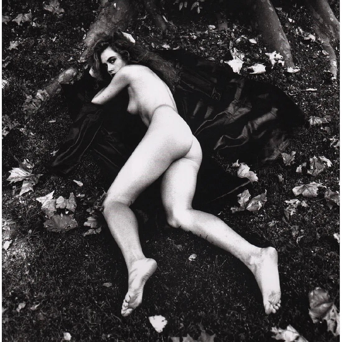 Helmut Newton (German-Australian, 1920-2004) Print: Helmut Newton (German-Australian, 1920-2004) Print. Villa d'Este, Como, Italy, "1989". Printed in 2000s, Germany. 9.50 x 9.50 inches. Not hand-signed unless otherwise stated. Photomechanical Print. Lo