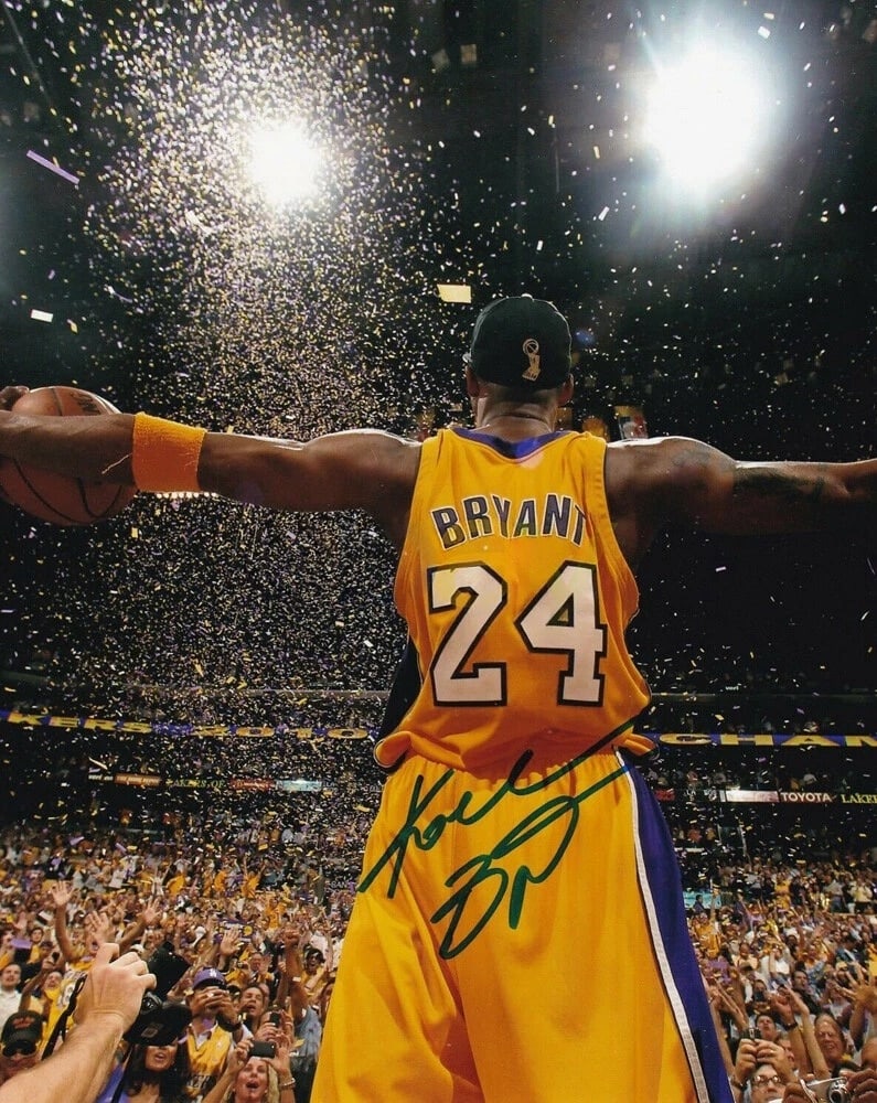 Kobe Bryant Signed Facismile Photo: Kobe Bryant Signed Facismile Photo. Not hand-signed unless otherwise stated. Photomechanical Print. Lots that contain nudity have been partially obscured in the listing; unblurred images are