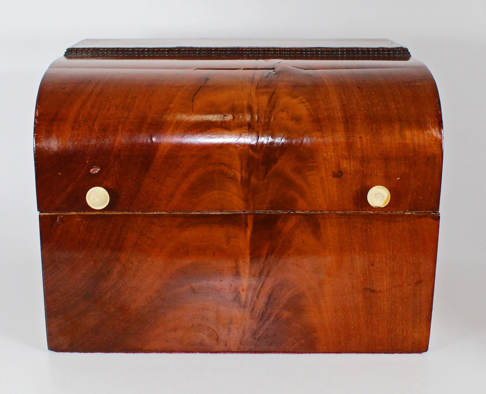 1800's English Wood Domed Letter/Document Box: 1800s English domed letter box with bone knobs. This Letter box, beautifully executed with Flame Mahogony veneer is adorned with small bone carved handles and a vibrant lilac interior. Dating to the f