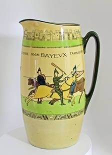 Royal Doulton Battle of Hastings Bayeux Tapestry Pitcher: Battle of Hastings Bayeux Tapestry in the style of Issac Walton. This water pitcher stands 12 1/2" tall with Royal Doulton mark on bottom with style code. Bayeux Tapestry was introduced to the Series
