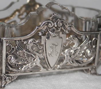 Pair of Victorian 800 Silver Salt Cellars: Pair of Victorian 800 Silver salt cellars. Beautifully figured and done in the Victorian Gothic, popularized during the latter part of the 1800's. Retaining original glass inserts. The salts show embl