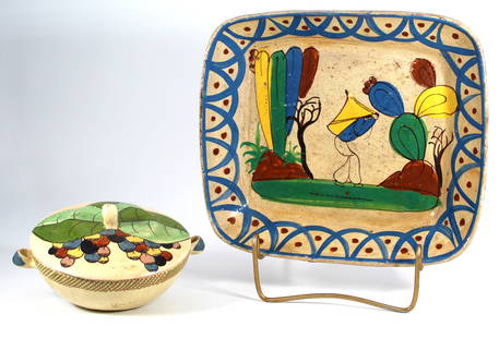 Mexican Cream Tlaquepaque folk art pottery circa 1940s: Two handmade Mexican Cream Tlaquepaque pieces of colorful folk art pottery, circa 1940's. Also known as Talavera pottery or Jalisco. A large platter with cacti and villager Covered dish with handles,