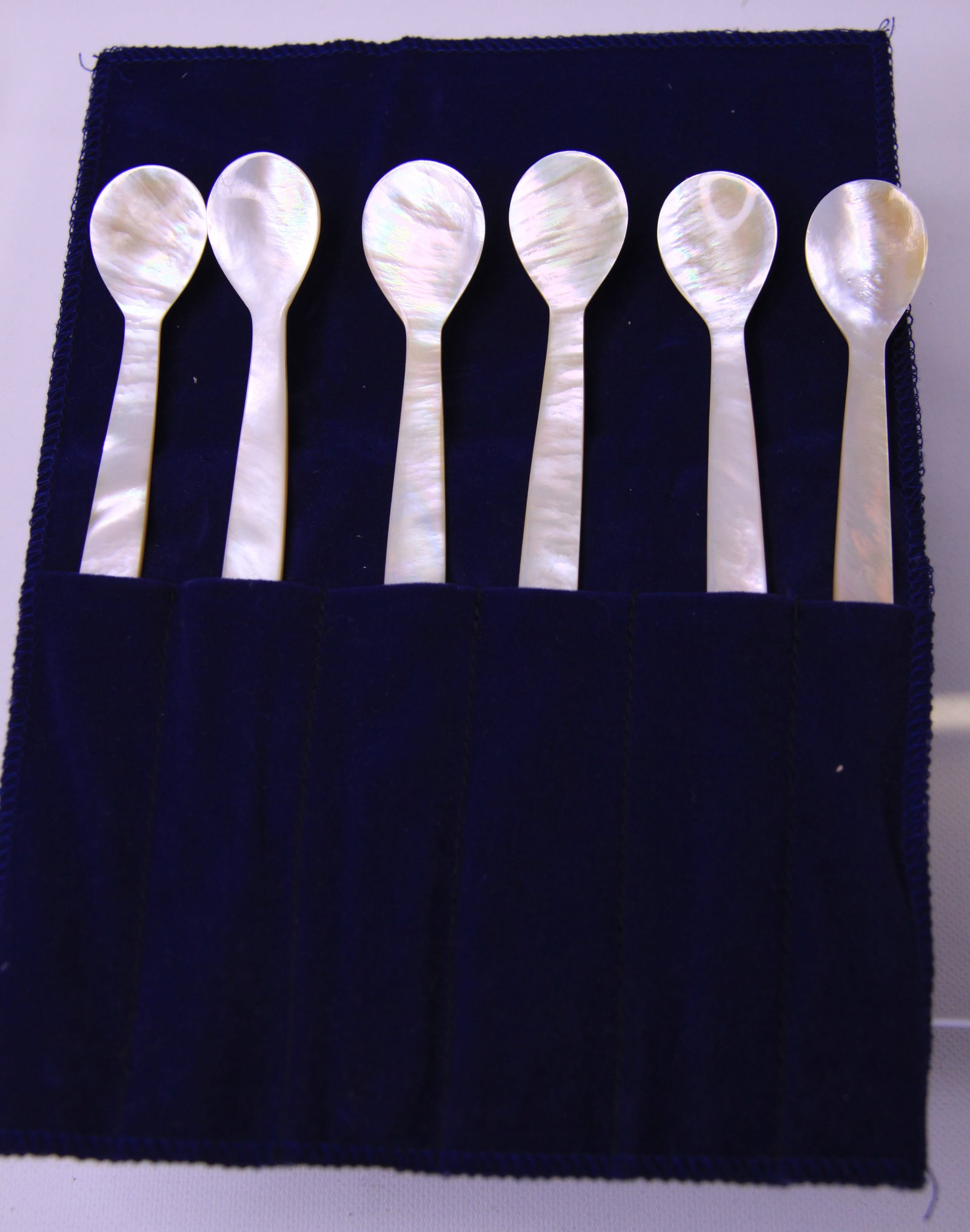 Fine Quality Mother of Pearl Caviar Spoons: Mother of Pearl set of 6 Caviar Spoons. A very fine vintage set of quality mother of pearl spoons to elevate the experience and preserve the taste of the caviar. Last picture is a grouping of this set