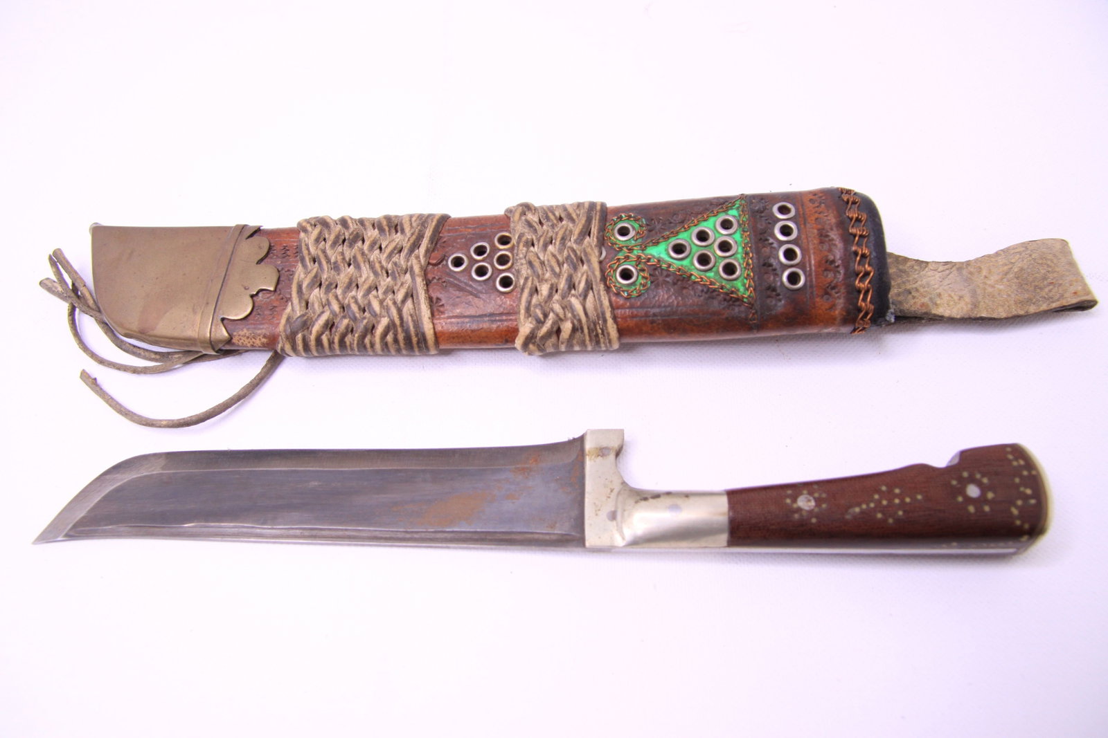 Horn of Africa Knife & Decorated Leather Scabbard, Somali/Ethiopian Region: Unusual 20th/21th-century knife or dagger attributed to the Horn of Africa, possibly the Somali, Somaliland, Ogaden or neighboring Ethiopian region. The piece features a substantial single-edged steel
