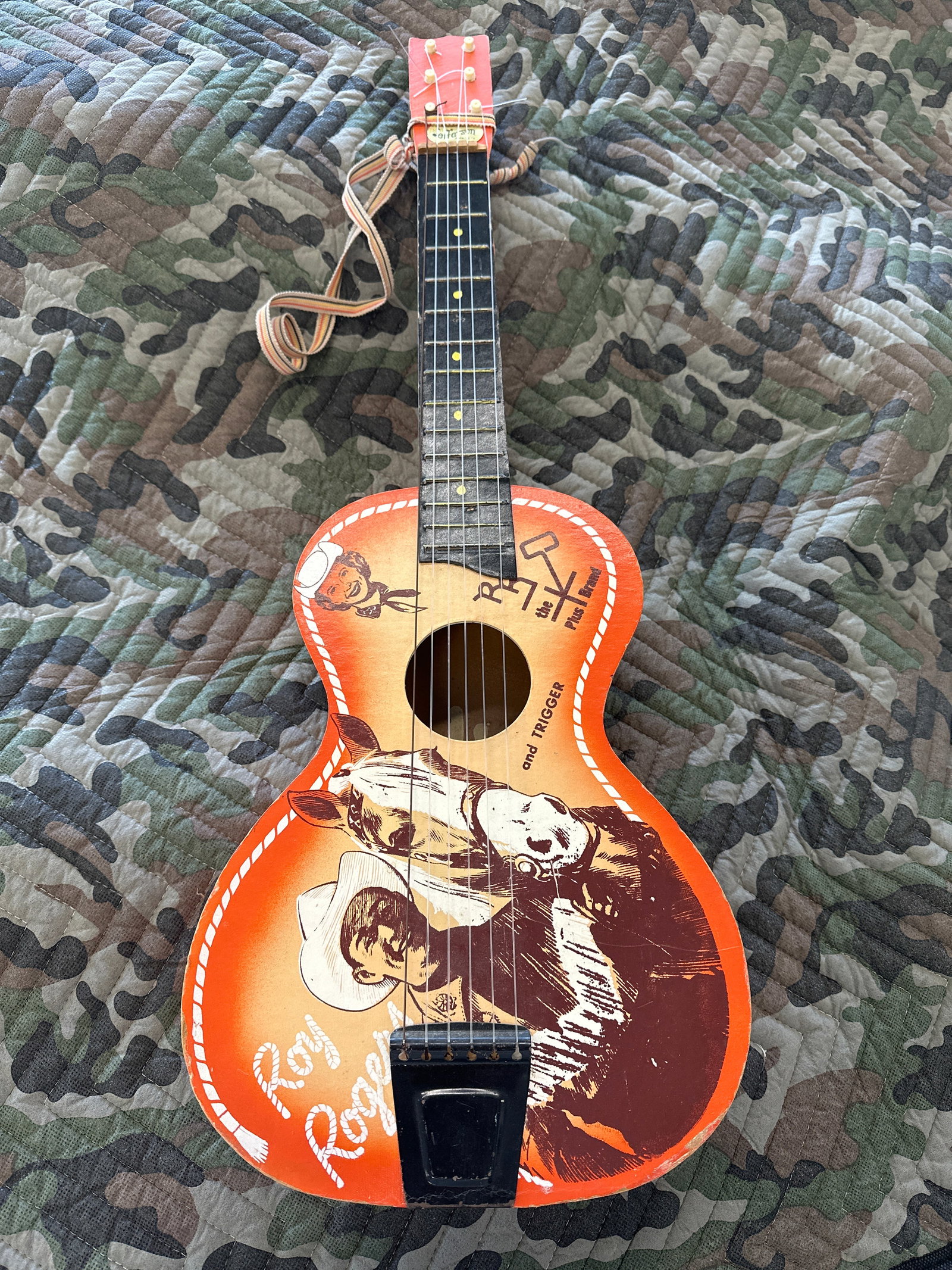 Antique Roy Rogers Guitar: Step back in time with this vintage Roy Rogers toy guitar, a must-have for collectors of Western memorabilia and classic toys. Featuring a colorful, cowboy-themed design with iconic Roy Rogers imagery