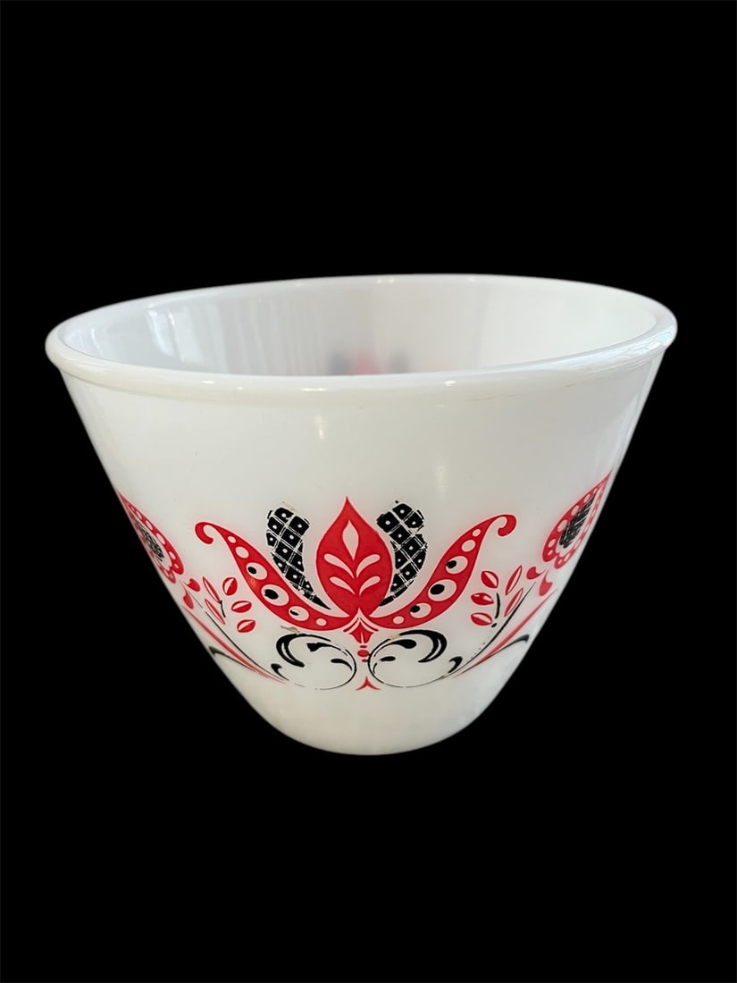 Vintage Fire King Modern Tulip Tapered Mixing Bowl: This Vintage Fire King Modern Tulip Tapered Mixing Bowl is a charming piece of mid-century kitchenware, perfect for collectors or anyone who appreciates the timeless style and durability of Fire King