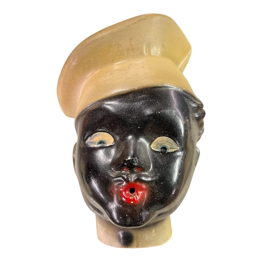 This Vintage American Chef String Holder: This Vintage American Chef String Holder is a delightful and functional piece of mid-20th-century kitchenware. Designed in the shape of a jovial, smiling chef, this charming string holder features a v