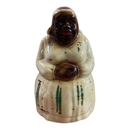 Vintage Mammy Americana String Holder: This Vintage Mammy Americana String Holder is a delightful and functional piece of mid-century kitchen decor, perfect for adding a touch of nostalgic charm to any home. Featuring a sweet figurine of a