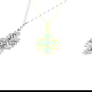14k Yellow Gold Emerald Diamond Pendant: 14k Yellow Gold Emerald and Diamond Pendant offers timeless elegance and fine craftsmanship. A dazzling combination of 5 emeralds and 48 round diamonds make this an exquisite choice for collectors and