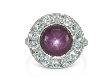 Platinum Art Deco 6.00 Carat Star Ruby & Diamond Halo Ring, Circa 1920s