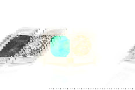 Antique Art Deco 1930s Emerald and Champagne Diamond Ring: Finely crafted in 18k yellow and white gold with an Old European cut Champagne Diamond weighing approximately 1.50 carats and an Emerald cut Emerald weighing approximately 1.30 carats. Circa 1930s Siz