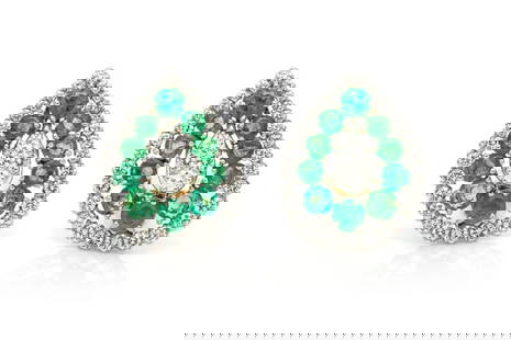 David Webb 18k Gold Emerald Diamond Earrings: Vintage 1960s David Webb earrings finely crafted in 18k gold and platinum, set with approximately 4.50 carats of round brilliant cut diamonds and 8.50 carats of round cut emeralds. A luxurious signed