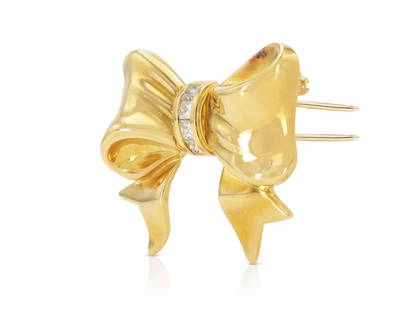 Tiffany & Co. 18k Gold Diamond Bow Brooch: Vintage Tiffany & Co. bow brooch, circa 1980s. - 18k yellow gold - Princess cut diamonds, approx. 0.40 ct total - Signed Tiffany & Co., American craftsmanship - Excellent vintage condition, minimal we