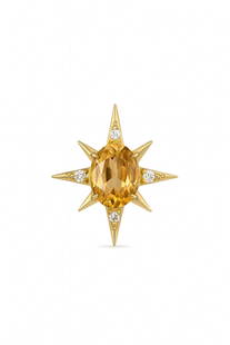 14k Gold Orange Sapphire Compass Pendant: 14k yellow gold compass star pendant set with an orange sapphire and four round diamonds. Modern fine jewelry with bold, directional style. - Oval-cut orange sapphire, approx. 1.60 carats - 4 round di