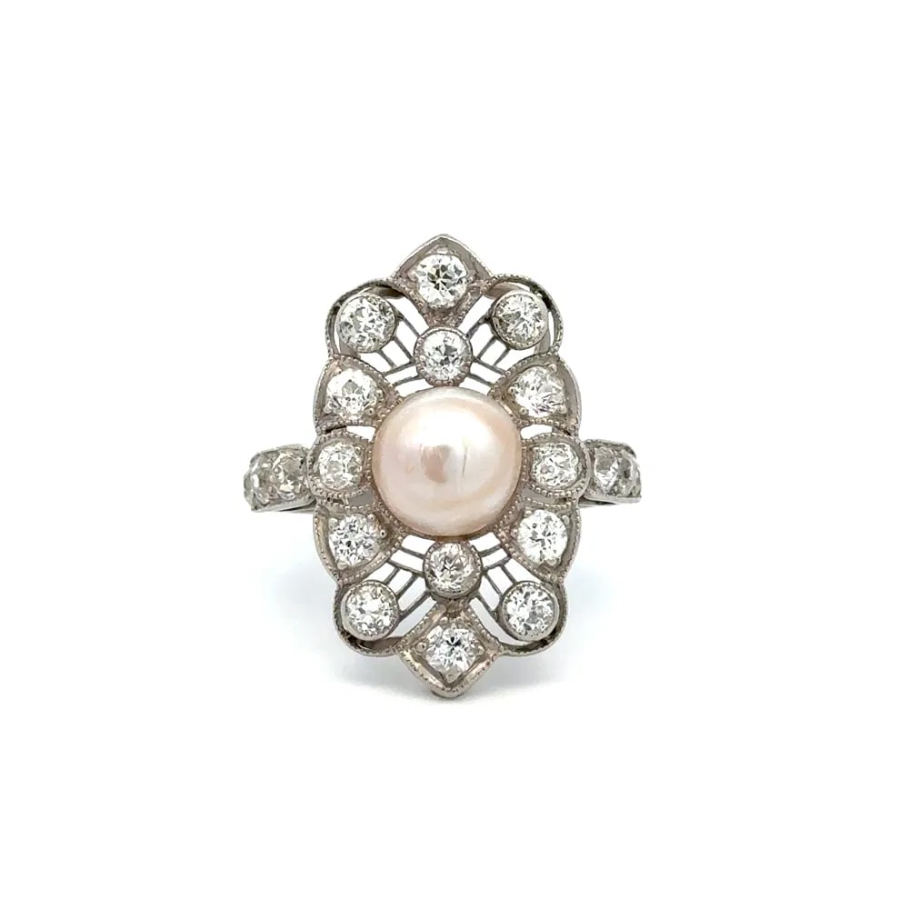Art Deco Platinum Pearl Diamond Filigree Ring: Platinum Art Deco navette ring featuring a 7.6mm flat pearl and 2.00tcw of Old European Cut diamonds in an angular filigree setting, a rare geometric estate piece from the 1920s. - Center: 7.6mm flat