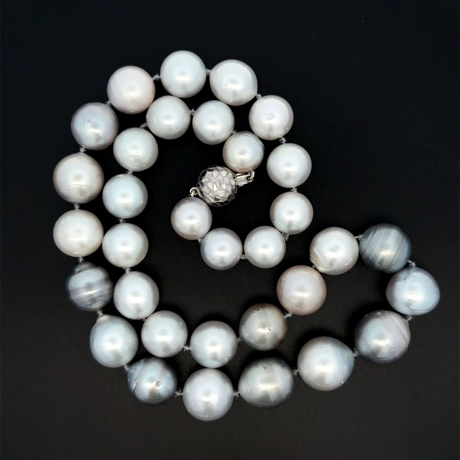 14k WG South Sea Pearl Necklace: Multi-color South Sea pearl necklace with 14k white gold clasp featuring large graduated pearls from 11.50mm to 14.50mm, an impressive luxury strand. - South Sea pearls approx. 11.50mm to 14.50mm - Mu