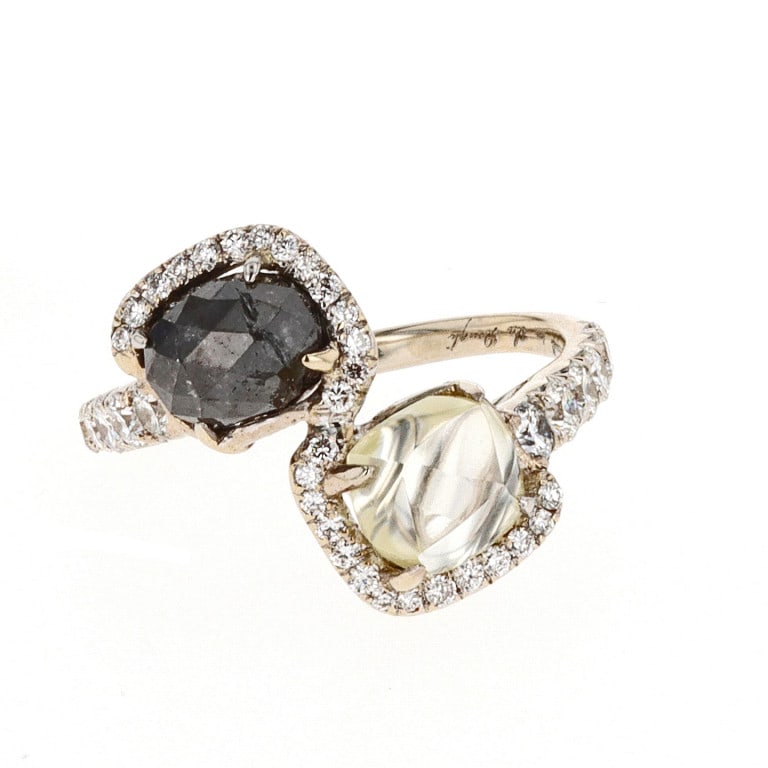 18k WG Black White Diamond Ring: 1970s by-pass ring in 18k white gold set with black and white diamonds totaling over 4.00 carats, a bold vintage statement cocktail ring. - White diamonds approx. 1.60 carats - Black diamonds approx.