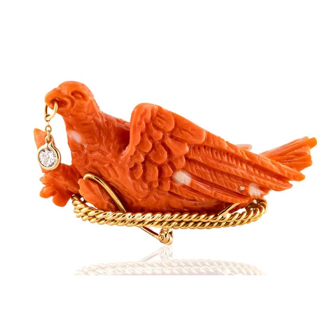 Victorian 18k Gold Coral Bird Brooch: Victorian brooch featuring a carved coral bird set in 18k yellow gold, accented with a 0.20ct white diamond—an early 20th century collectible with sculptural detail. - Hand-carved coral bird motif -