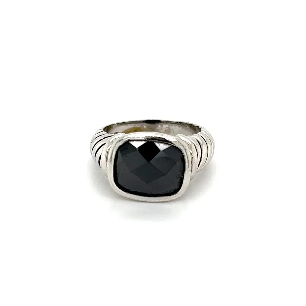 Sterling Silver 6ct Black Spinel Ring: Bold sterling silver ring featuring a 6ct black spinel in a secure bezel setting, accented by a twisted rope band design for added texture and depth. - Center: Black spinel, approx. 6.00 carats - 925