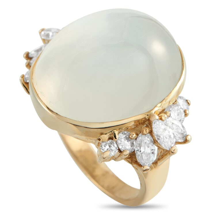 14k Gold Moonstone Diamond Ring: Estate 14k yellow gold ring featuring a luminous 25.0ct cabochon moonstone accented by 1.28ct of marquise and round diamonds in a refined, wearable design. - Center: bezel-set moonstone cabochon, appr