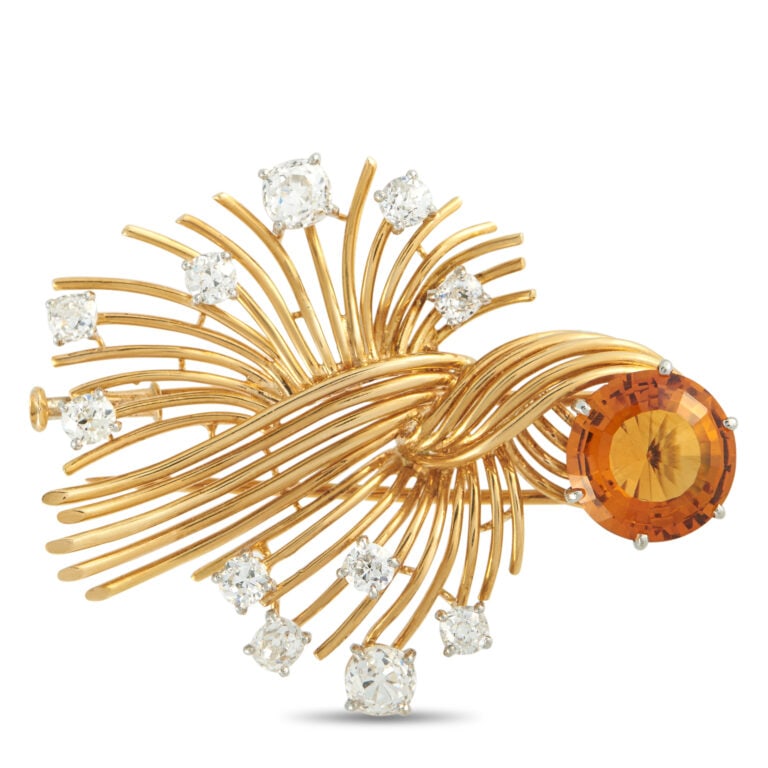 Chaumet 18k Gold Citrine Diamond Brooch: Chaumet brooch in 18k yellow gold featuring a stylized spray motif with 2.0ct total diamonds and a vibrant round citrine centerpiece. - 18k yellow gold construction with wirework spray design - Total