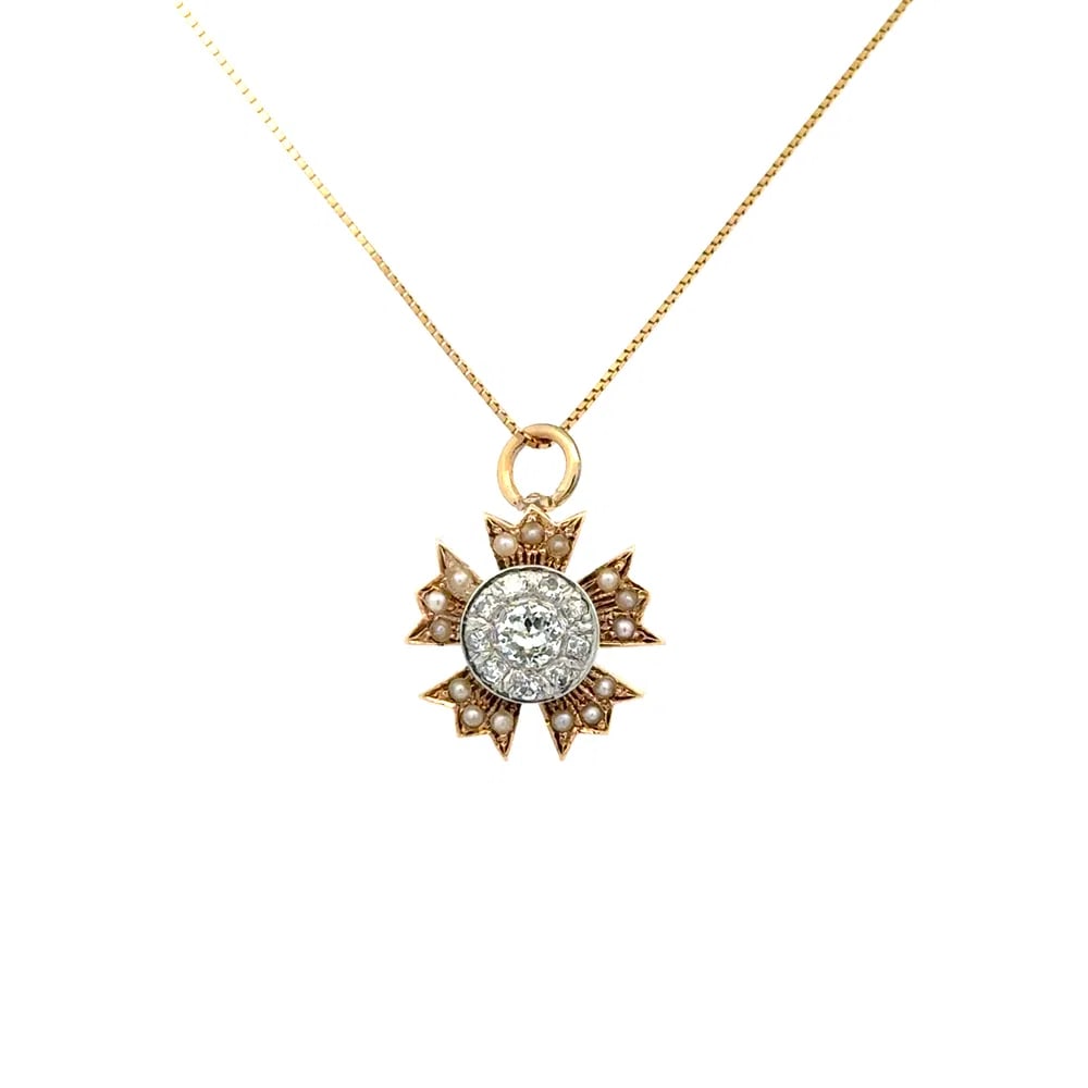 Victorian 14k Gold Diamond Pearl Pendant: Victorian five-petal flower pendant in 14k yellow gold set with approx. 0.37tcw Old European Cut diamonds and seed pearls, suspended from a matching chain. - Crafted in 14k yellow gold with antique pa