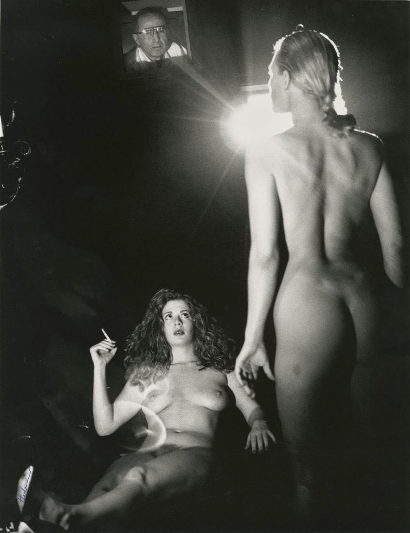 HELMUT NEWTON - In a Private Projection Room,: Helmut Newton (German/Australian, 1920-2004). "In a Private Projection Room, Beverly Hills". Photolithograph. 1991. Printed 1991. Signed in pen, lower left. Fine, quality printing. Very good condition