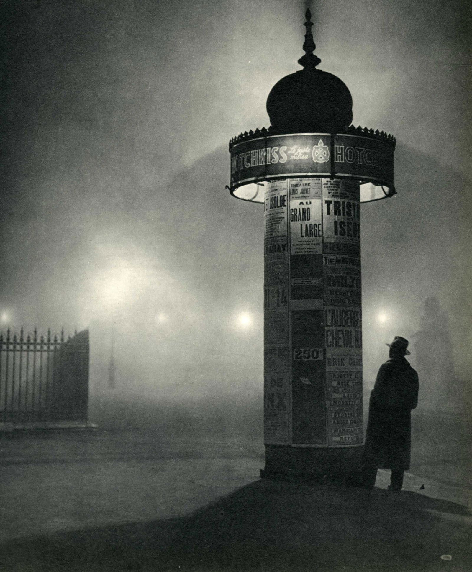 BRASSAI [gyula halasz] - Une colonne Morris dans le: Artist: Brassai [gyula halasz] (Hungarian/French, 1899-1984). Title: "Une colonne Morris dans le brouillard". Medium: Original vintage photogravure. Date: 1932. Printed 1935. Lot Note(s): Sta