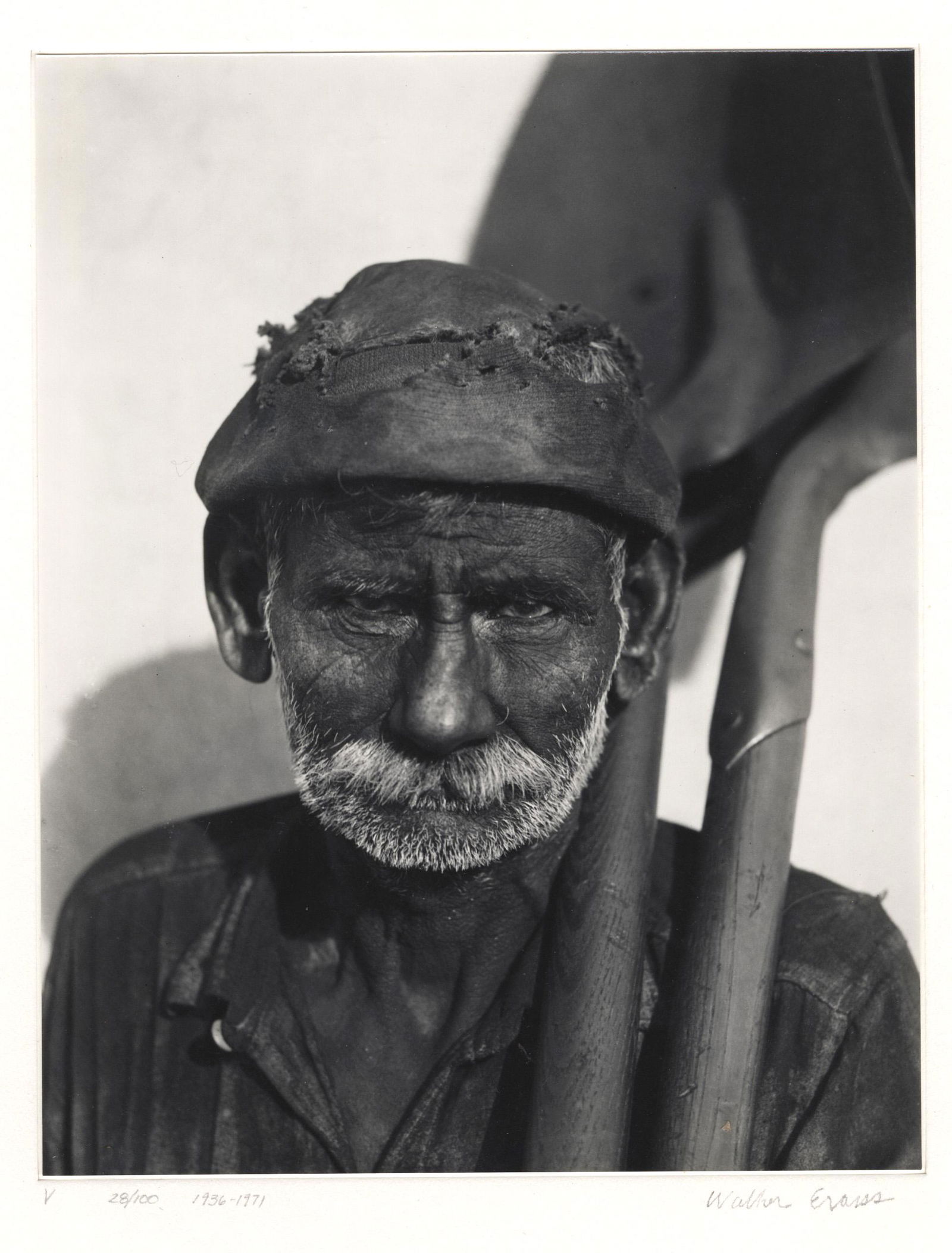 WALKER EVANS - Coal Dock Worker, Havana, Cuba - Gelatin: Artist: Walker Evans (American, 1903 - 1975). Title: "Coal Dock Worker, Havana, Cuba [two shovels]". Medium: Gelatin silver print. Date: Composed 1932. Printed 1971. Dimensions: Overall size: