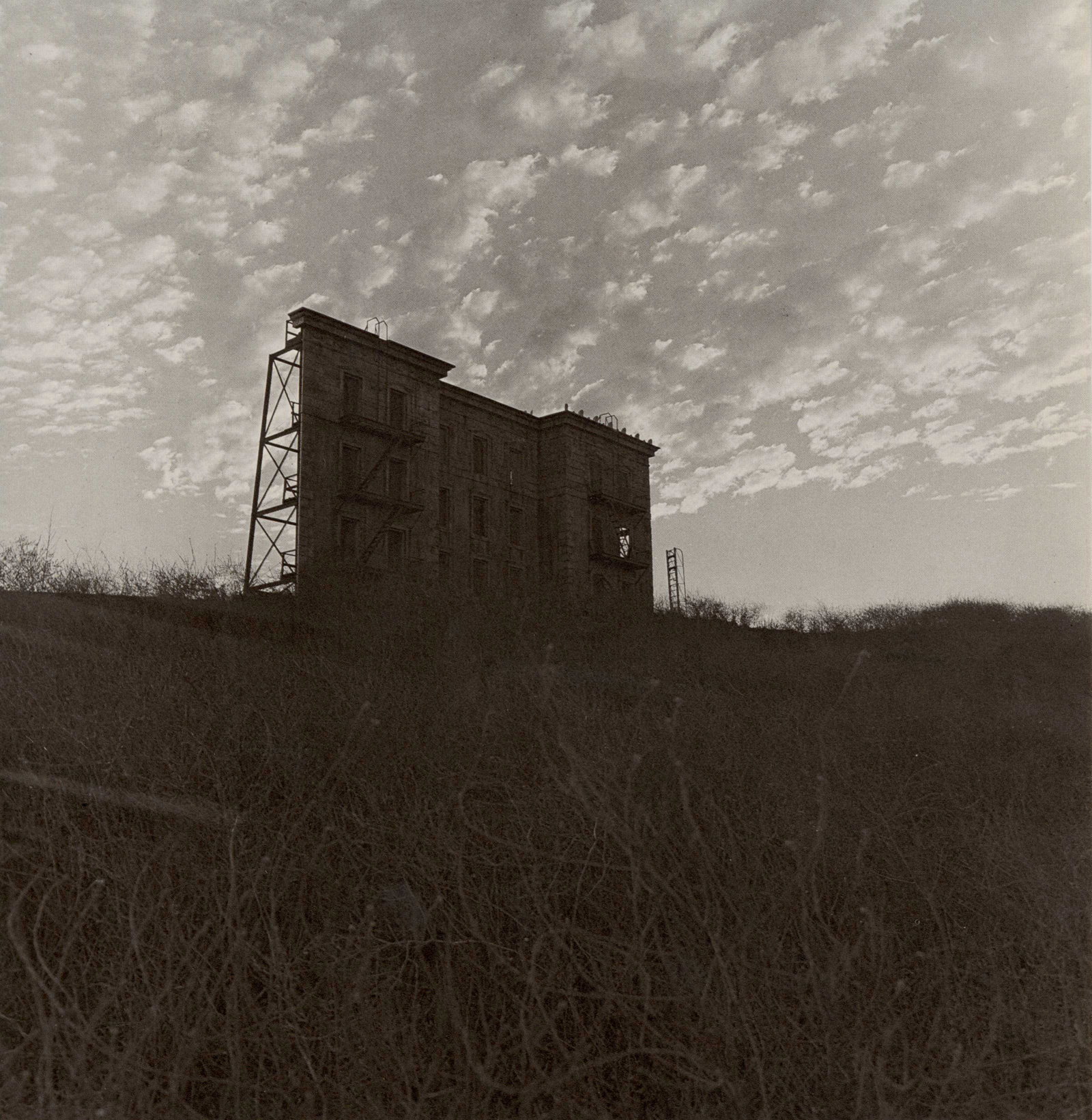 DIANE ARBUS - A House on a Hill, Hollywood, CA -: Artist: Diane Arbus (American, 1923-1971). Title: "A House on a Hill, Hollywood, CA". Medium: Original photogravure. Date: Composed 1963. Printed later. Dimensions: Overall size: 8 1/4 x 8 3/