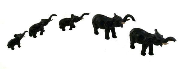 AMERICAN SCHOOL [20TH CENTURY] Metalware: American School [20th Century]. "Set of Five Metal Elephants". Metalware. Each vary in size. Largest figure measures from feet to top of trunk 3 1/4"H and from tail to tip of trunk 4"L. Smallest figur