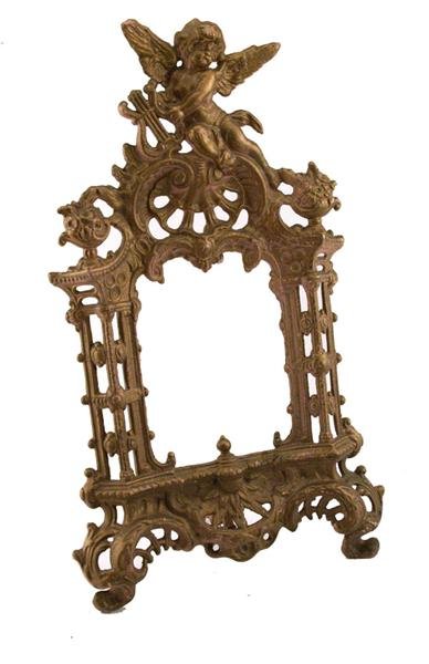 CONTINENTAL SCHOOL [20TH CENTURY] Metalware: Continental School [20th Century]. "Painted Metal Frame with Angelic Motif". Metalware. 8 in. (length) x 12 3/4 in. (height). [22596]